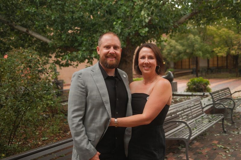 Michael and Lauren Singley under a tree in downtown Santa Fe.